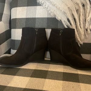 Like new size 7 Maurices black wedge bootie with gold buckle detail.